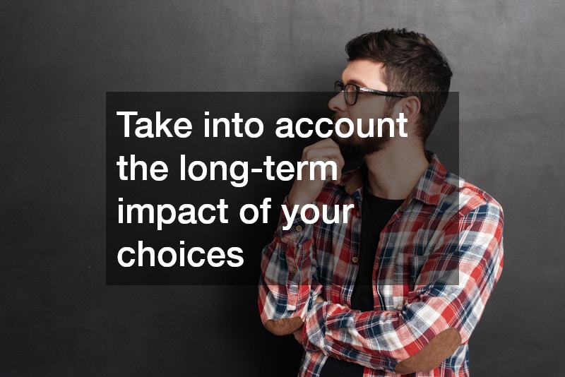 man in plaid shirt holding beard thinking